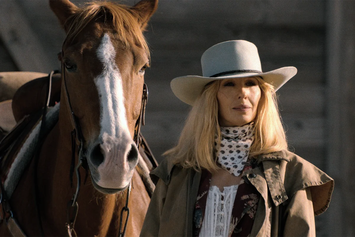 Beth’s tan duster coat on Dutton Ranch