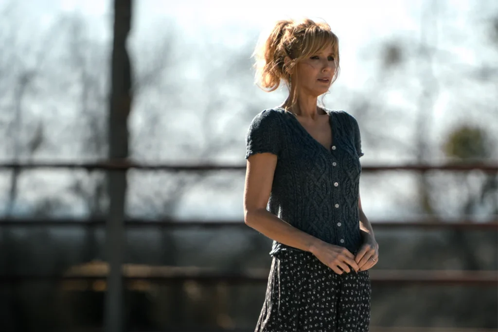 Beth's blue knit top on Dutton Ranch