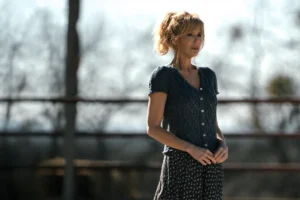 Beth's blue knit top on Dutton Ranch