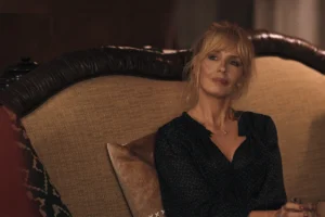 Beth's navy sheer blouse on Dutton Ranch