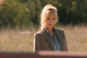 Beth's tan plaid blazer + bootcut jeans on Dutton Ranch