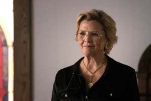 Beulah's black satin dress + gold pave earrings on Dutton Ranch
