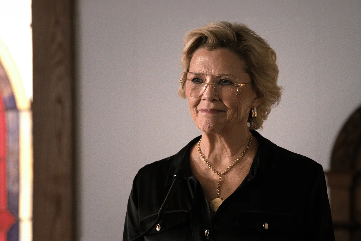Beulah's black satin dress + gold pave earrings on Dutton Ranch