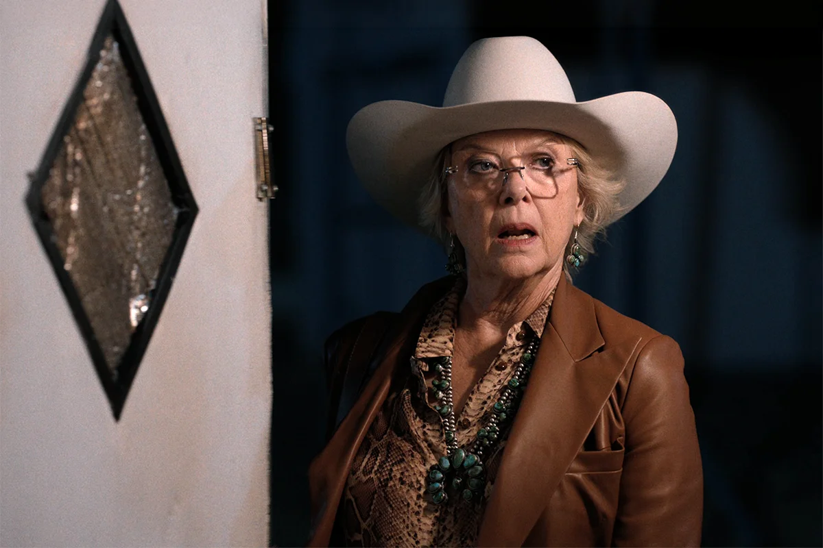 Beulah's tan leather blazer + snake print shirt on Dutton Ranch