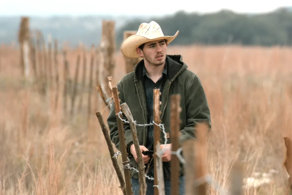Carter's dark green Carhartt hoodie on Dutton Ranch