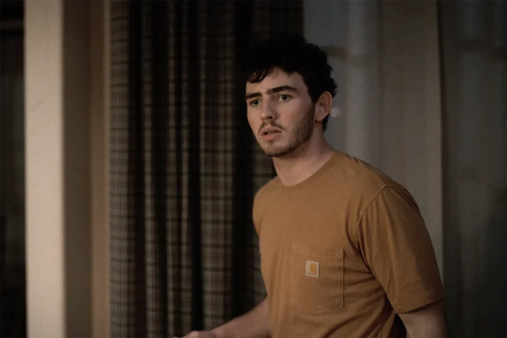 Carter's orange Carhartt shirt on Dutton Ranch