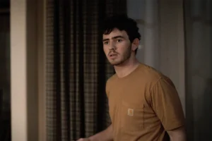 Carter's orange Carhartt shirt on Dutton Ranch