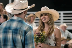 Cassie's ivory rose print top on Dutton Ranch