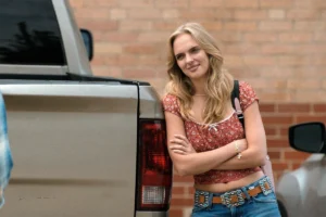 Cassie's tan western belt + Wrangler jeans on Dutton Ranch