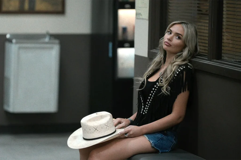 Oreana's black suede studded vest on Dutton Ranch