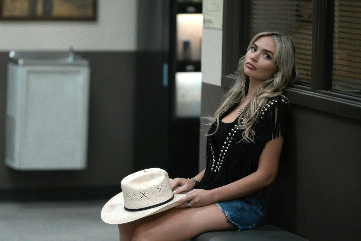 Oreana's black suede studded vest on Dutton Ranch