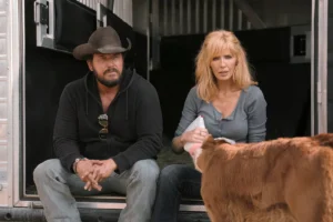 Rip's gold sunglasses + Beth's bootcut jeans on Dutton Ranch
